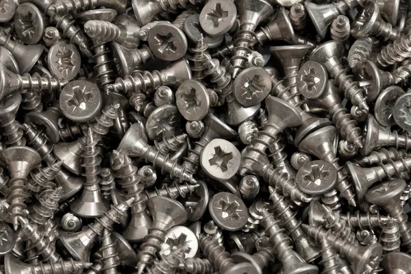 Background from set of screws — Stockfoto