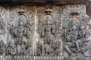 Ancient sculptures in ruins at an indian temple clipart