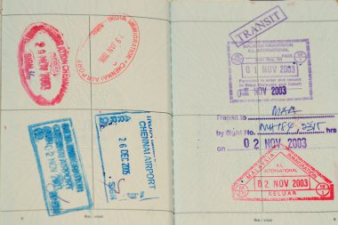 Passport immigration stamps and boarding pass, ready to travel clipart