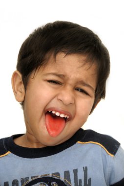 An handsome Indian kid looking very animated clipart