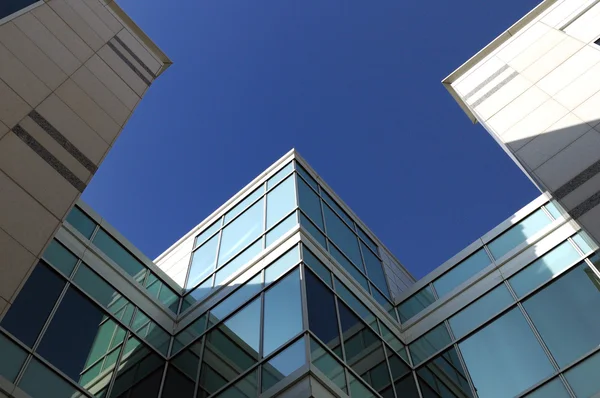 Modern Geometric Skyscrapers Clear Blue Sky — Stock Photo, Image