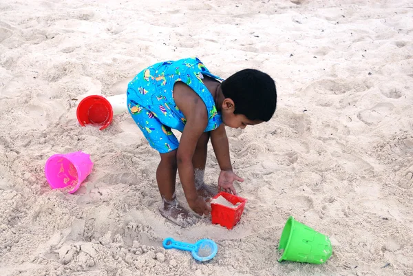 Handsome Indian Kid Playing Sand Tropical Beach — Stockfoto