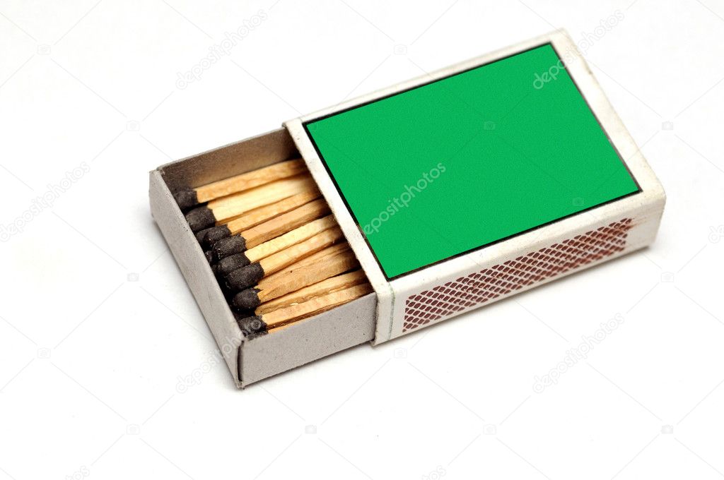 A green matchbox isolated on a white background