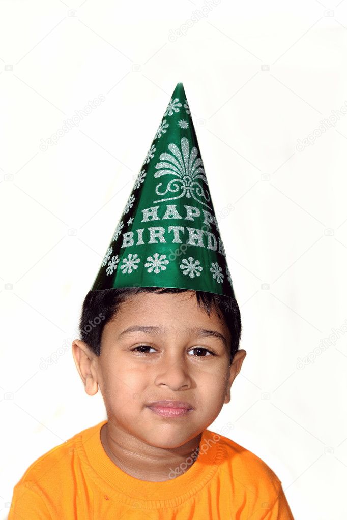 An handsome Indian kid celebrating happy birthday