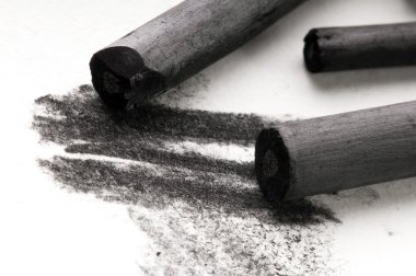 Artist's black charcoal with smudge clipart