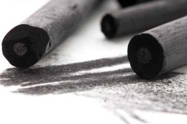 Artist's black charcoal with smudge clipart