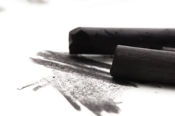 Artist's black charcoal with smudge — Stock Photo, Image