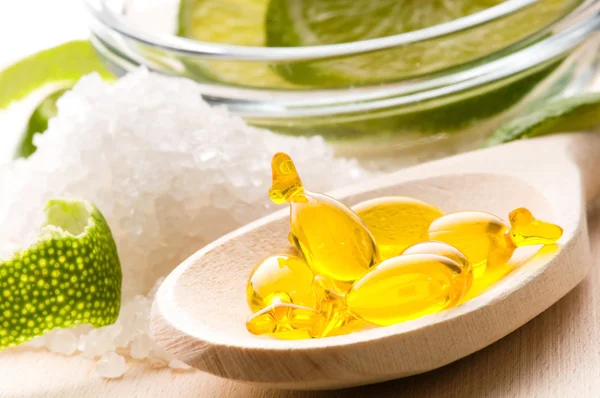 stock image Lemon bath - bath salt, capsule and fresh fruits