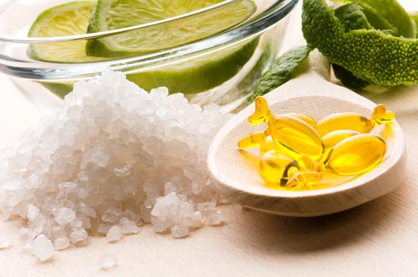 Lemon bath - bath salt, capsule and fresh fruits — Stock Photo, Image