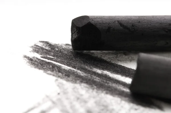 Artist's black charcoal with smudge — Stock Photo, Image