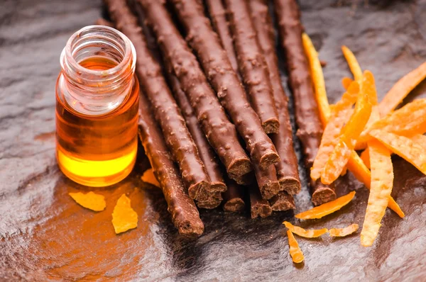 Varas de chocolate com laranja — Fotografia de Stock