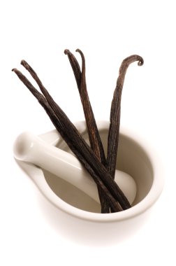 Mortar with vanilla pods clipart