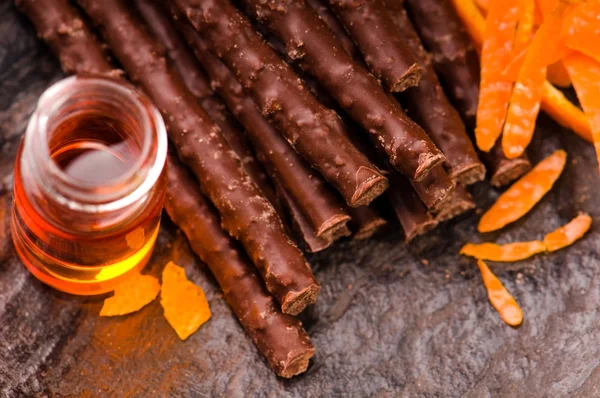 Chocolate sticks with orange — Stock Photo, Image