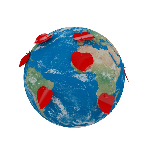 Jorden med hjärta form klistermärken — Stockfoto