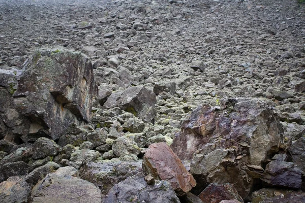 stock image Mountain slope with a crumbling natural stone