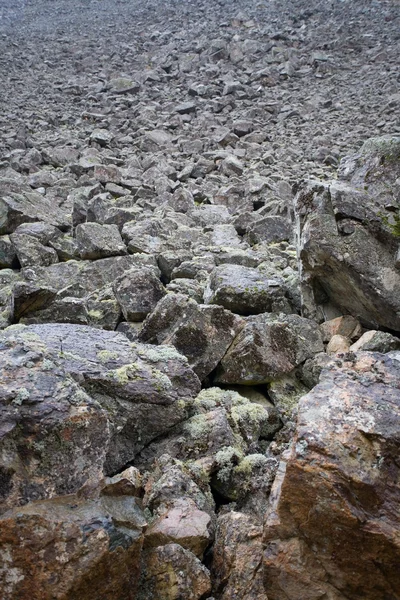 stock image Mountain slope with a crumbling natural stone