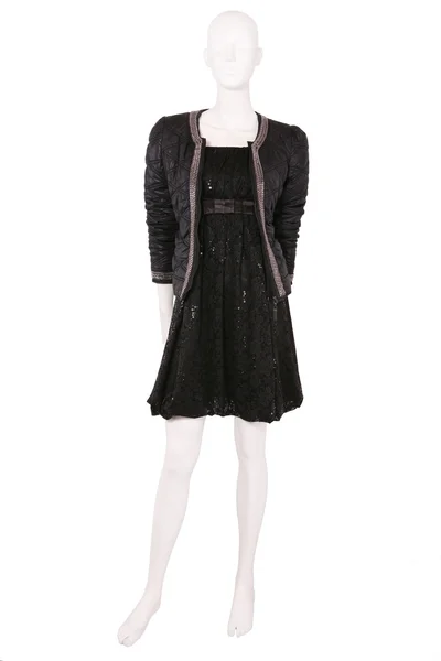 Mannequin in jas en kleine zwarte jurk — Stockfoto