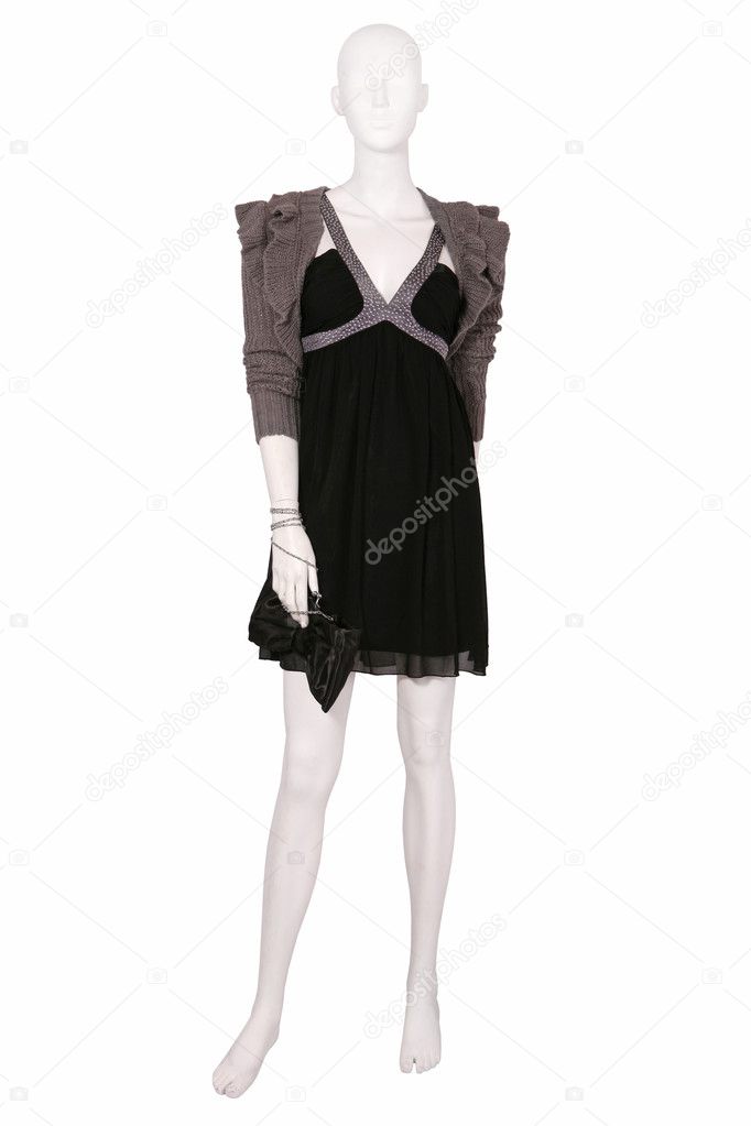 Mannequin dressed in sweater and little black dress