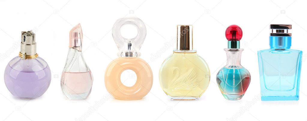 Collection of various perfumes isolated on white