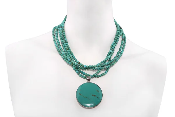 Green necklace on a mannequin — Stock Photo, Image