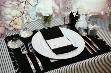 Luxurious dinner in black and white with name tag in the plate clipart