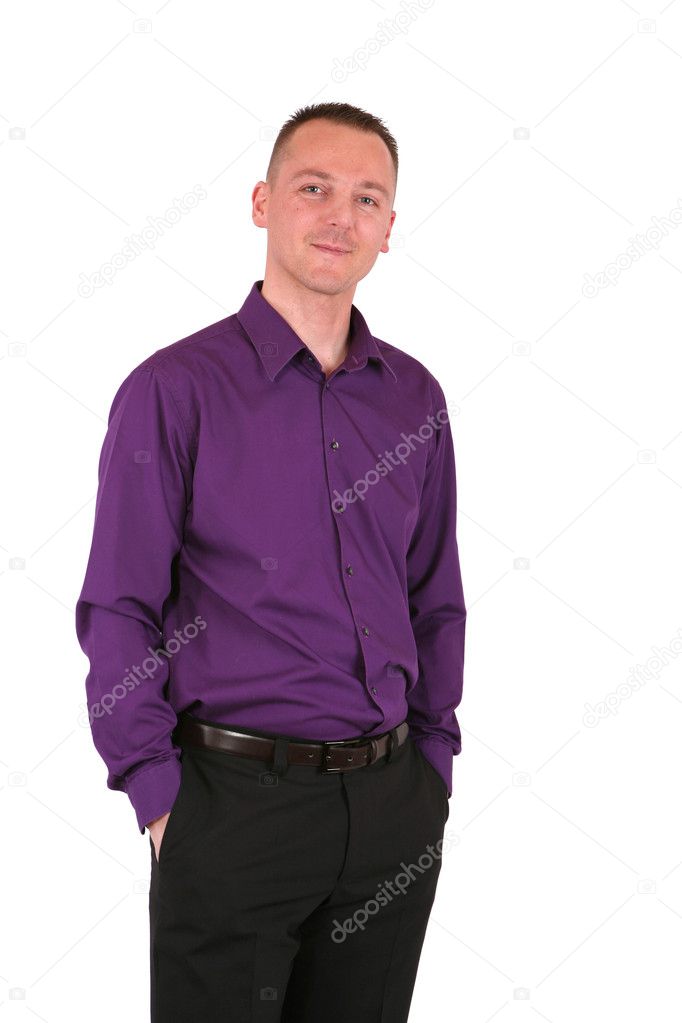 Young businessman with his hands in pockets