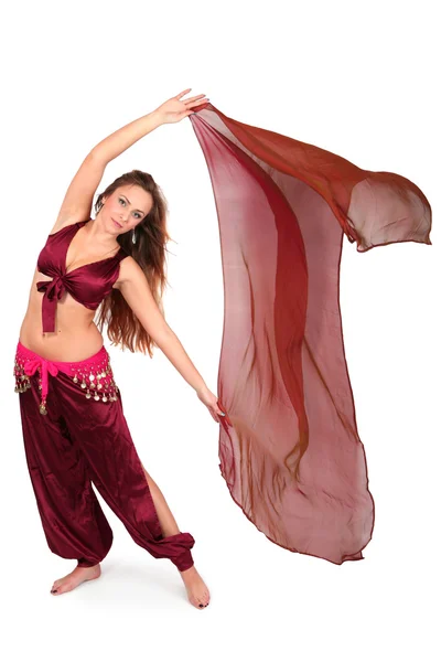 Beautiful young belly dancer with a veil — Stock Photo, Image