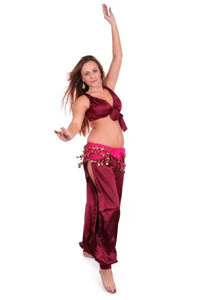 Beautiful young belly dancer in red costume — Stock Photo, Image
