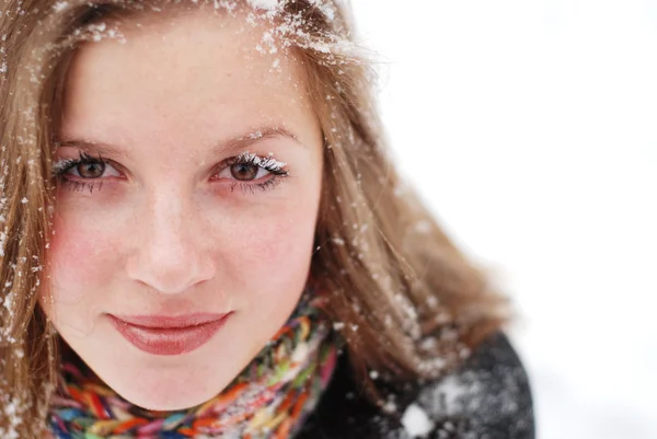 Vrouw en sneeuw Stockfoto