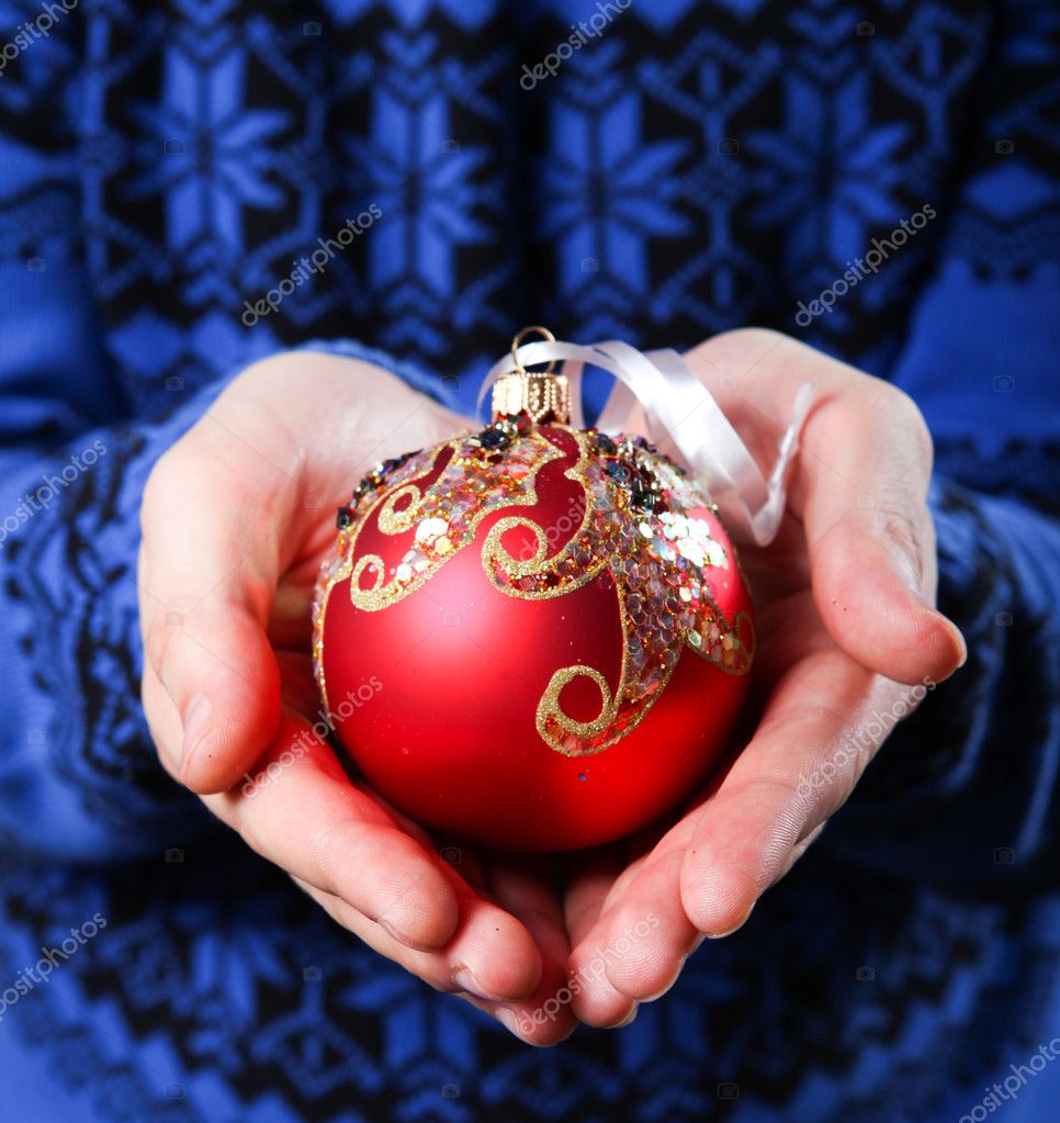 Christmas balls in hands — Stock Photo © Dmitroza #4446532