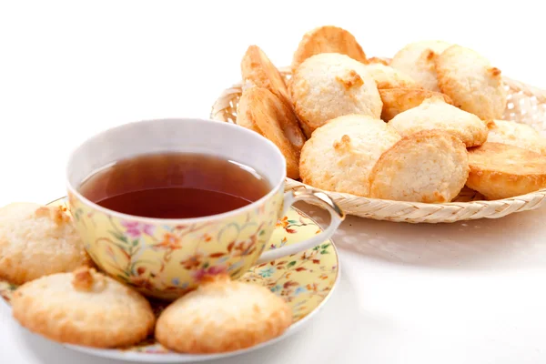 stock image Cup of black tea with sweet baking