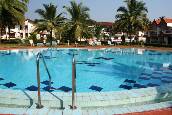 Houses and swimming pool with crystal clear water