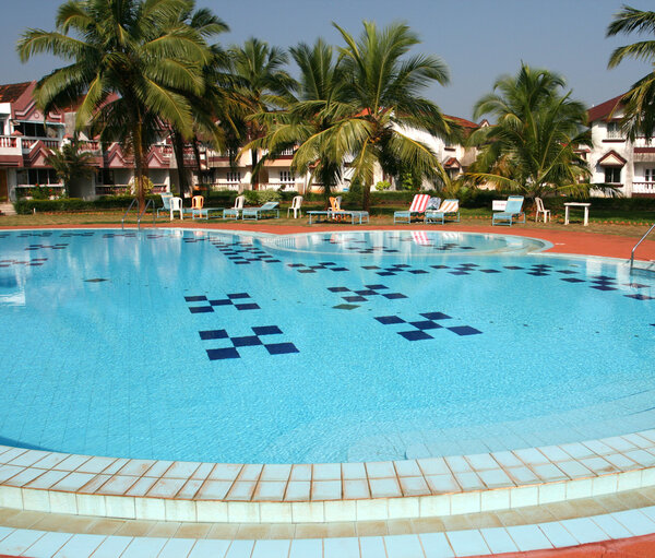 Houses and swimming pool with crystal clear water
