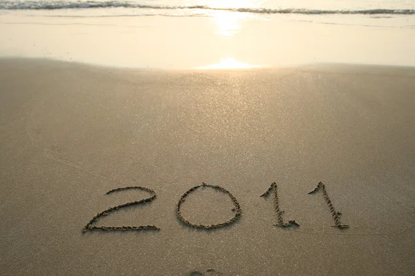 2011 year text on beach — Stock Photo, Image