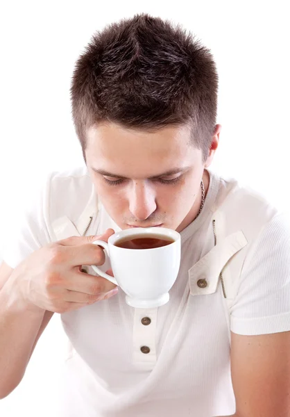 Muž s šálkem čaje — Stock fotografie