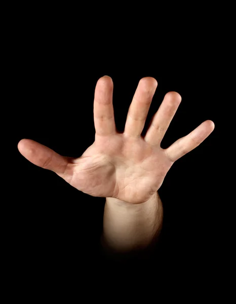 Hand isolated on black background — Stock Photo, Image