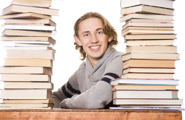 Der junge Student mit den Büchern — Stockfoto