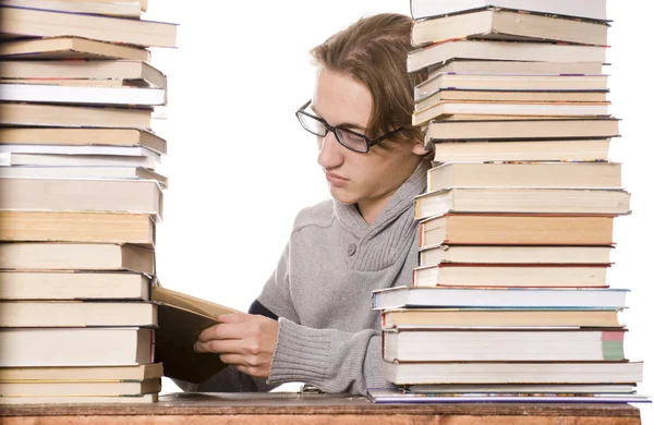 Den unga studerande med böcker — Stockfoto