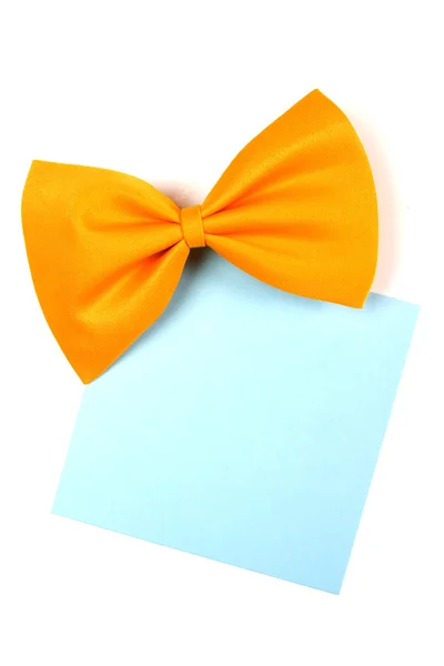 Yellow bowtie with blank paper note — Stock Photo, Image