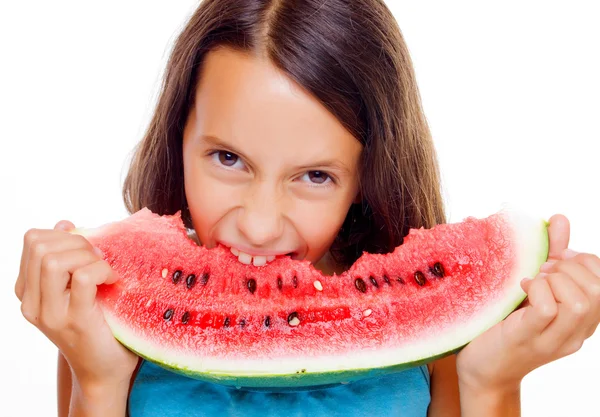 Mladá dívka jíst meloun — Stock fotografie