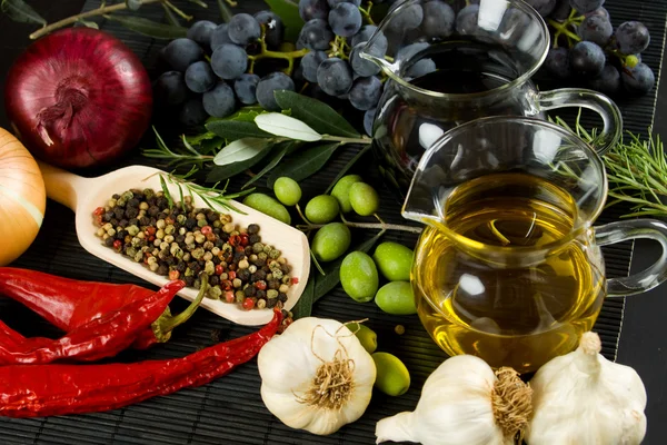 Extra virgin olive oil and mediterranean food ingredients — Stock Photo, Image