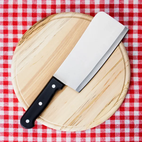 Cleaver on wooden chopping board — Stock Photo, Image