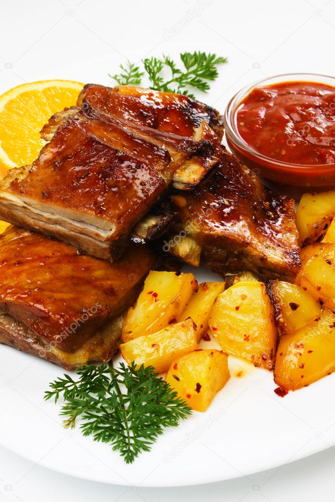 Barbecued ribs with baked potato