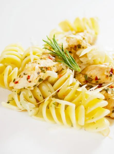 Italian pasta with chicken meat and grated cheese — Stock Photo, Image