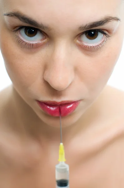 Woman with syringe — Stock Photo, Image