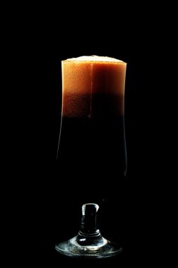 Dark beer,isolated on black background clipart