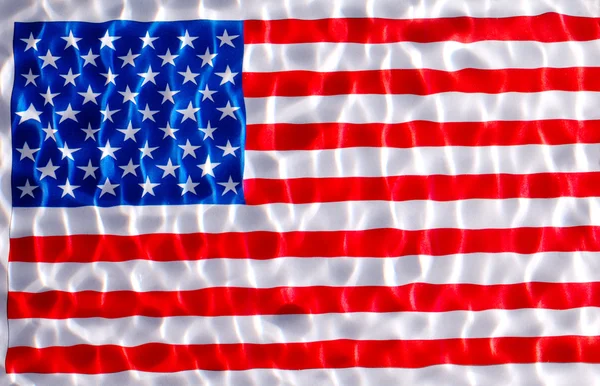 stock image American flag under water