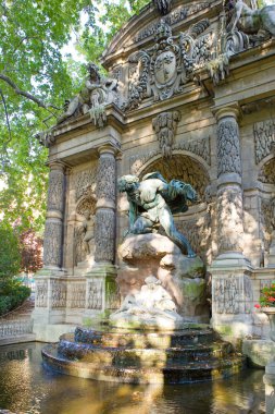 France. Paris. the Medici Fountain (La fontaine Medicis) in Luxembourg Gard clipart