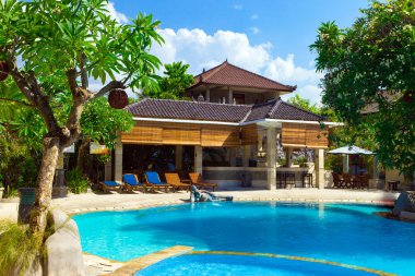 Asia. A tropical country house before pool clipart