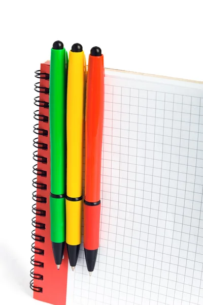 Three color ball pens and notebook — Stock Photo, Image